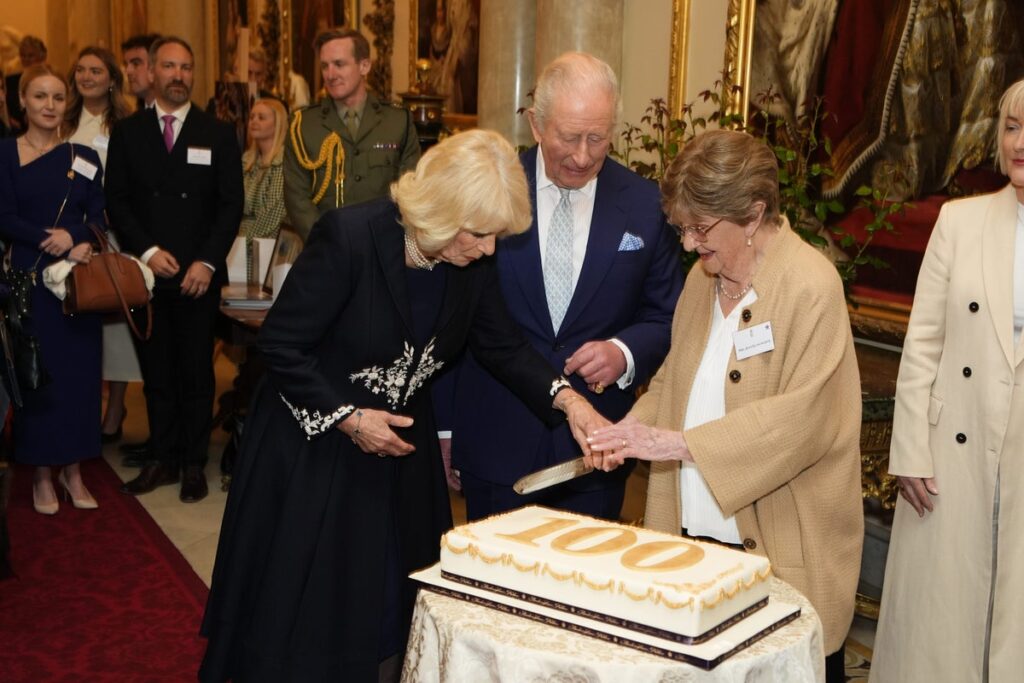 King and royal family share a sweet moment with centenarians at Queen Elizabeth celebration