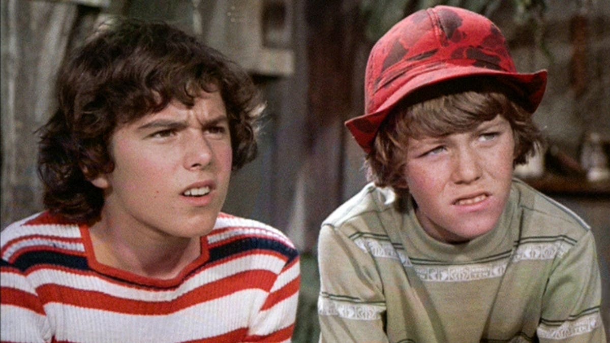 Christopher Knight and Mike Lookinland film a scene in "The Brady Bunch."