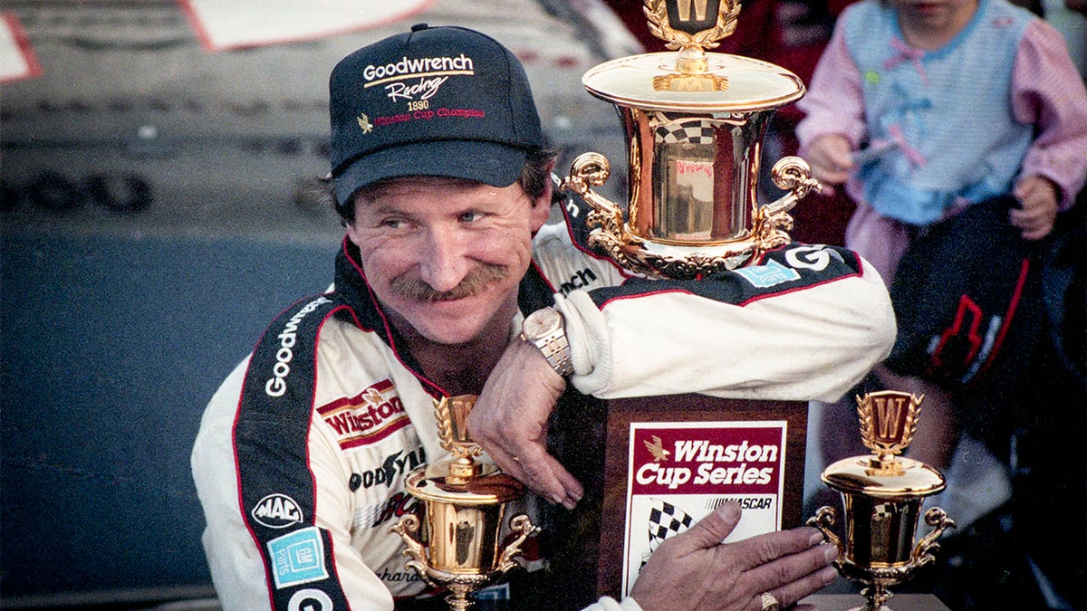 Dale Earnhardt celebrating his NASCAR Winston Cup Championship at Atlanta Motor Speedway