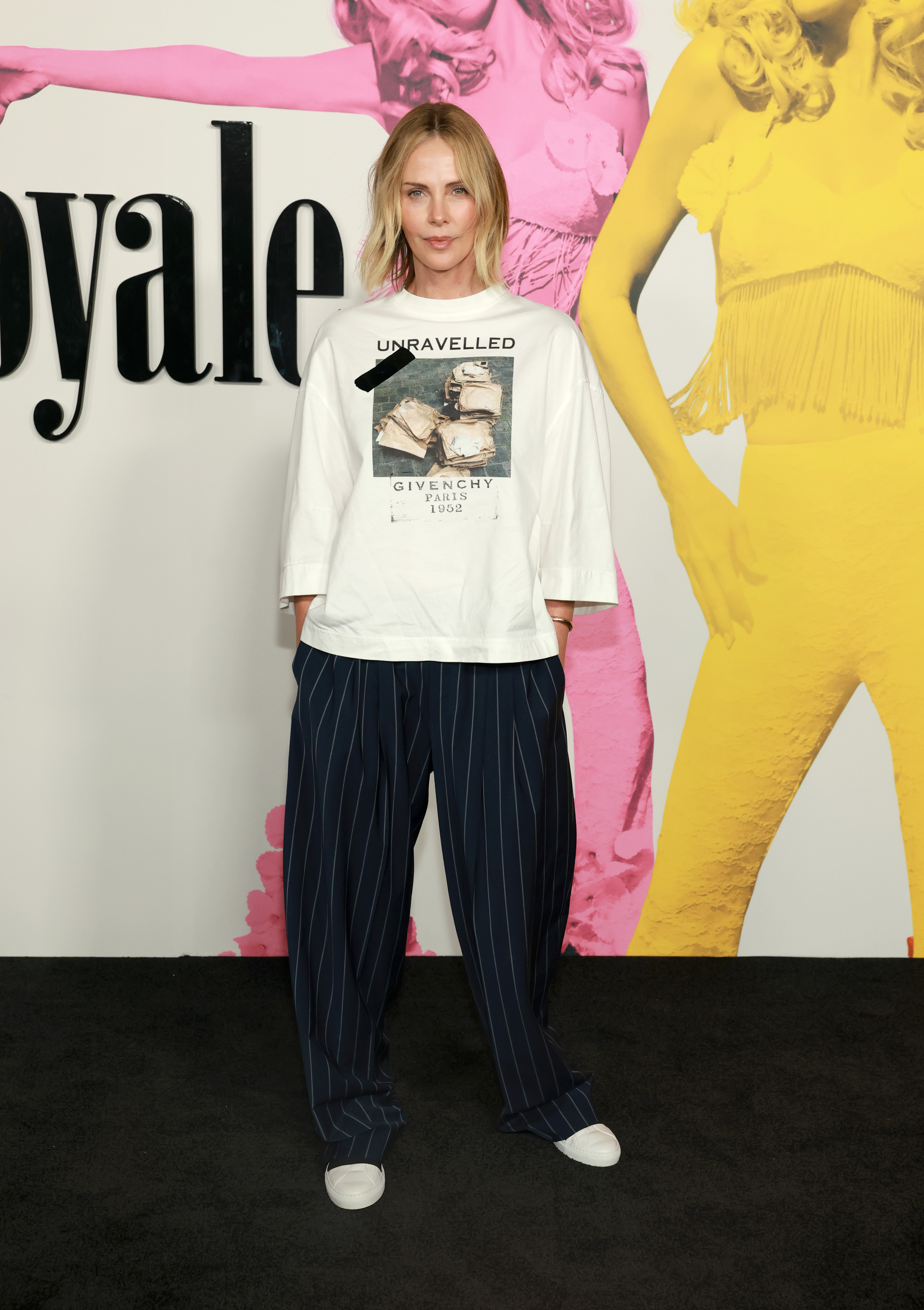 Charlize Theron wore the graphic tee trend to the Palm Royale premiere
