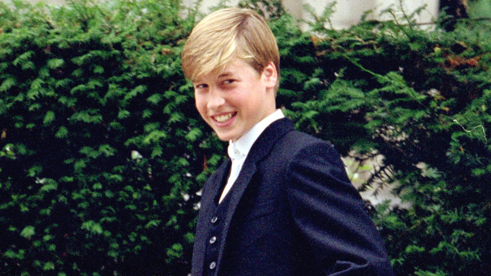 Prince William smiles on his first day at Eton College