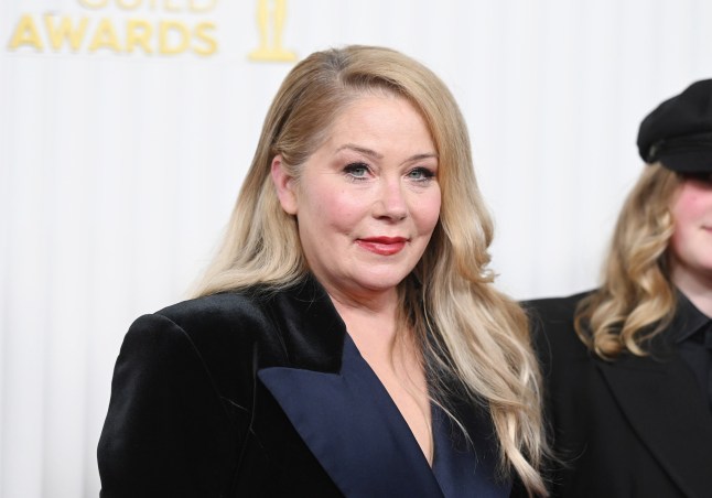 Christina Applegate wearing velvet outfit at awards ceremony