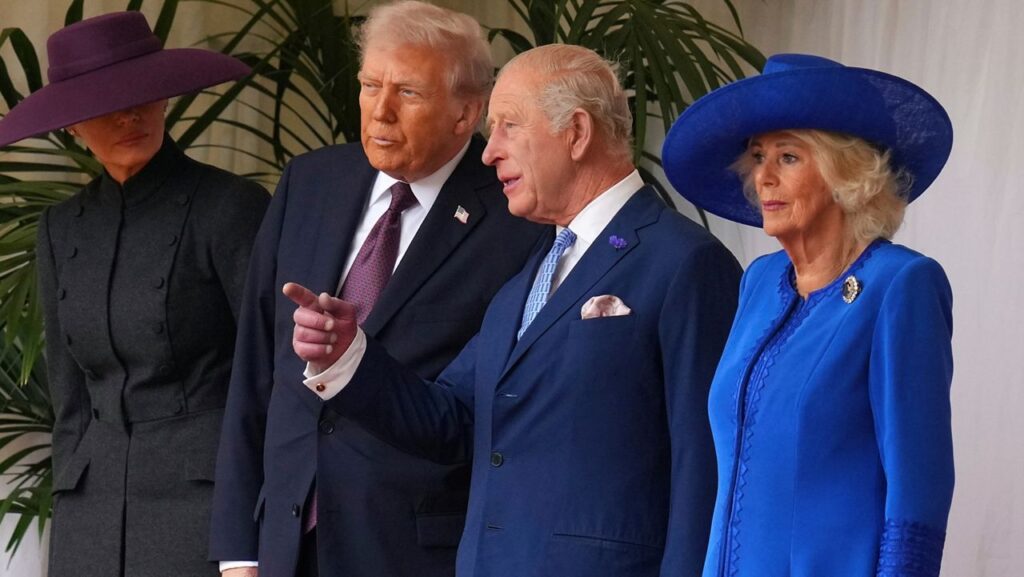 President Donald Trump, Britain's King Charles III, Queen Camilla and Melania Trump on the left wait to review the Guard of Honour at Windsor Castle in Windsor, England, Wednesday, Sept. 17, 2025.(AP Photo/Kirsty Wigglesworth, Pool, file)