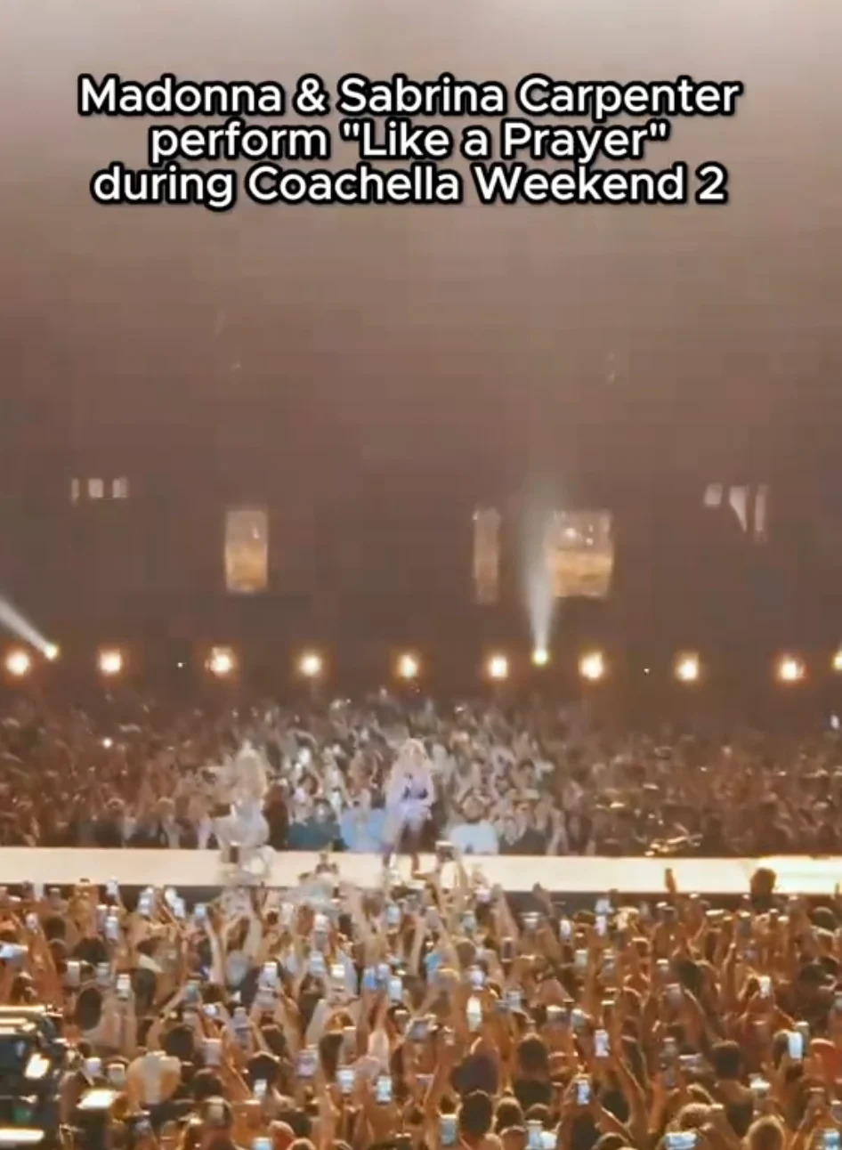 Stage view of Madonna and Sabrina Carpenter performing "Like a Prayer" at Coachella, with audience recording the event on phones