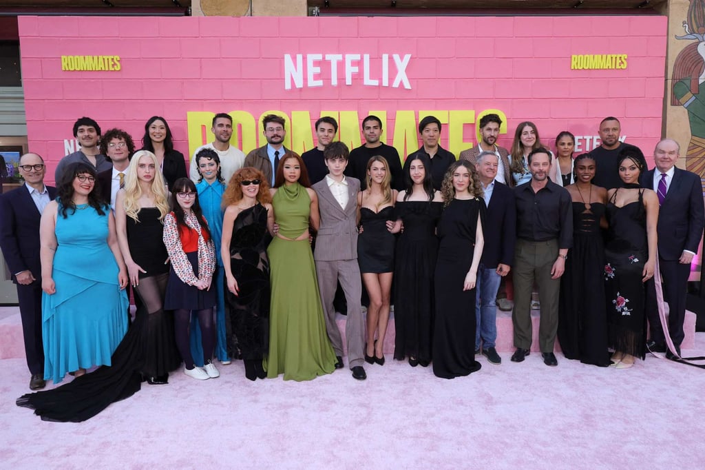 The cast and crew of Netflix’s Roommates – including Zahra Rock (front, second from right) – attend the film’s premiere at The Egyptian Theatre Hollywood on April 13, in Los Angeles, California. Photo: Getty Images via AFP