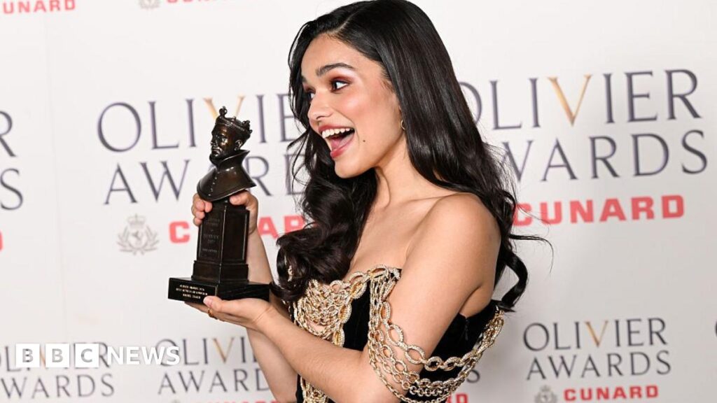 Picture of Rachel Zegler holding her Olivier award