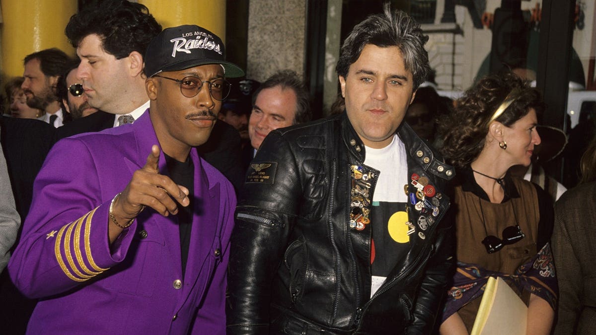 Arsenio Hall and Jay Leno standing together at Hollywood Walk of Fame