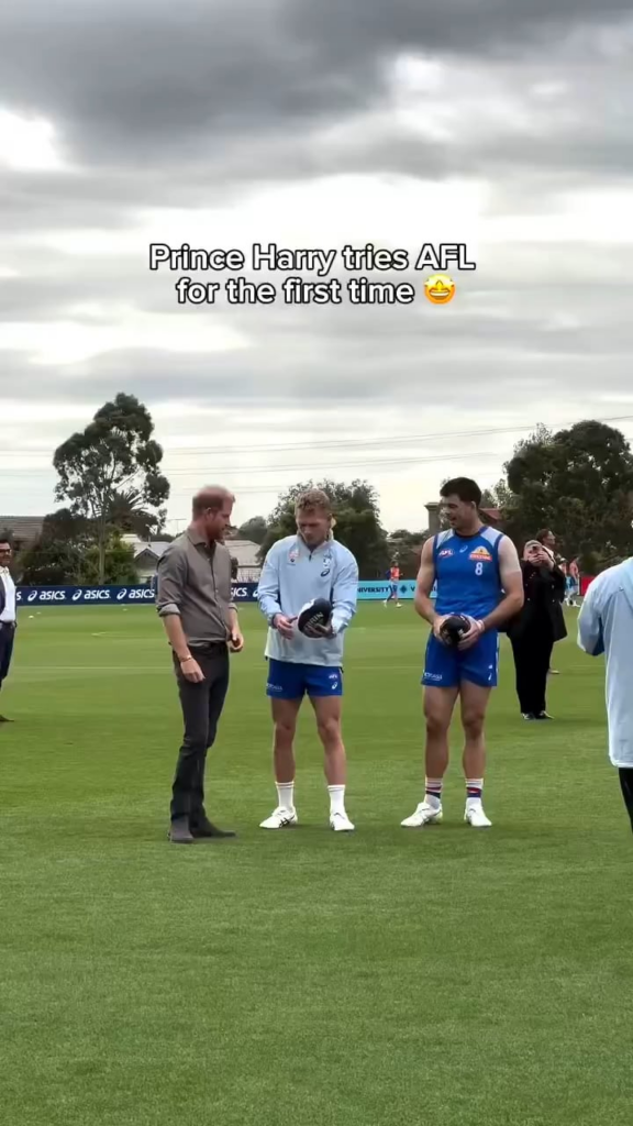 Prince Harry tries Aussie Rules football