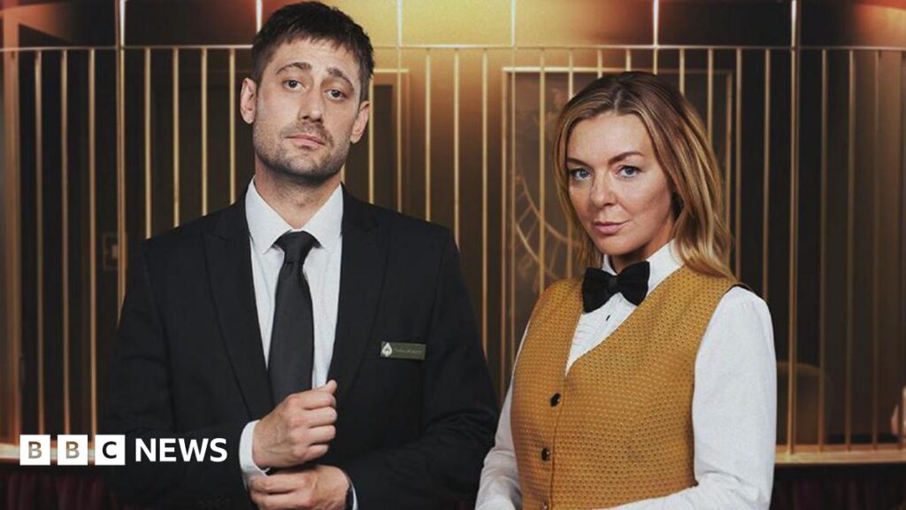Left: Matty (played by actor Michael Socha) dressed as a croupier wearing a black suit in TV drama The Cage alongside his co-star Leanne (Sheridan Smith) wearing a mustard coloured waistcoat and white shirt. The scene is set in a casino.