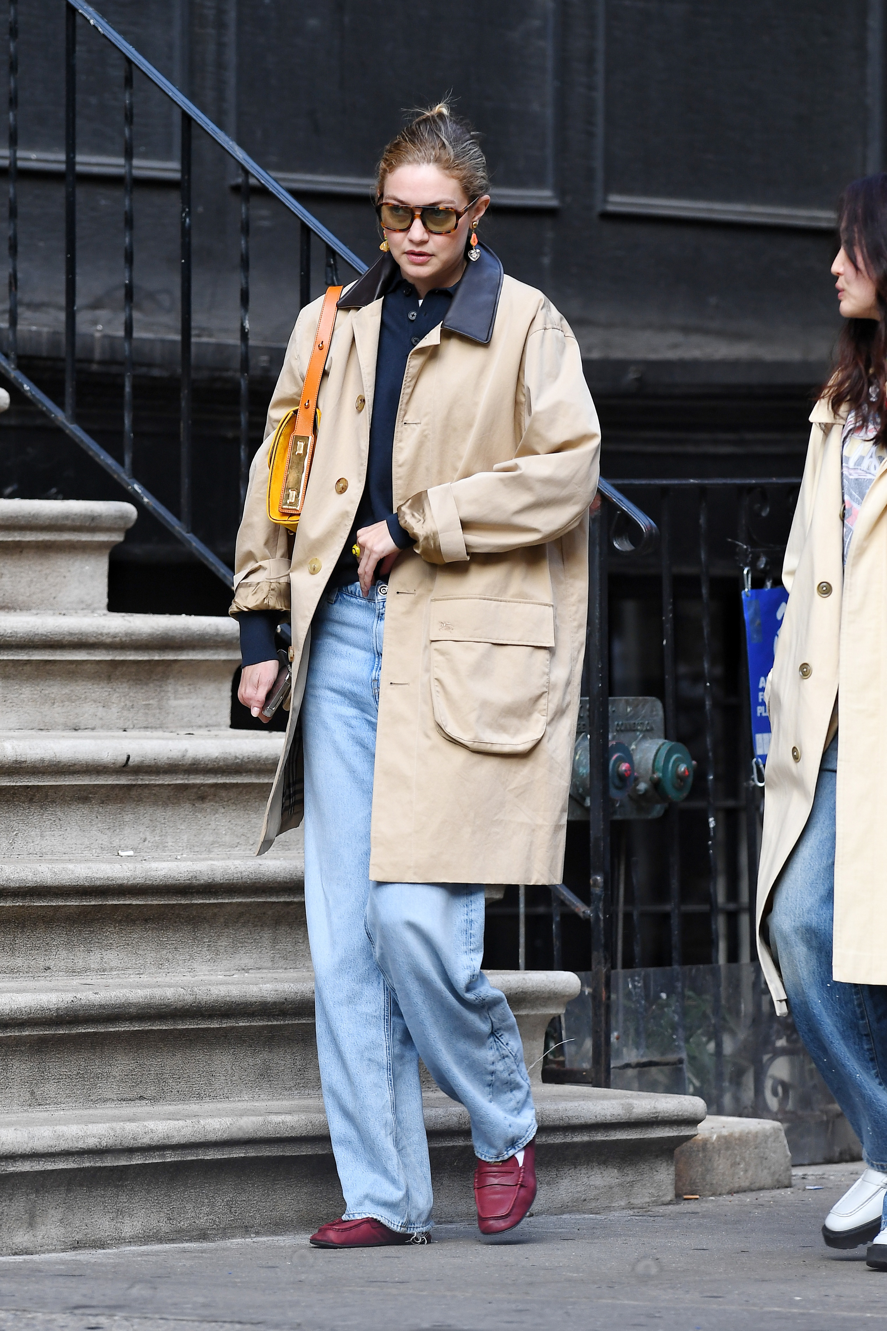 Gigi Hadid wore the spring camel jacket uniform with the soft loafers trend