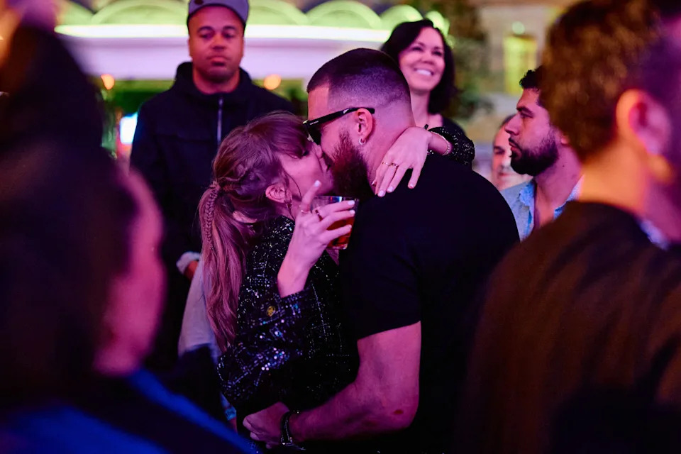 Taylor Swift and Travis Kelce share a kiss at XS Nightclub as Kansas City Chiefs celebrate Super Bowl win