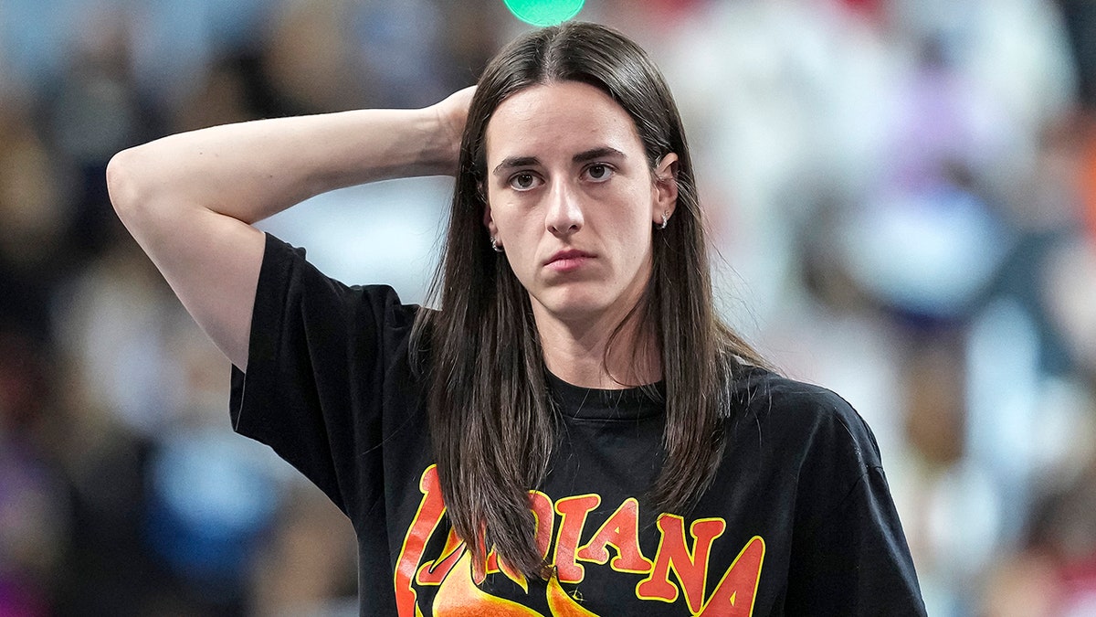 Indiana Fever guard Caitlin Clark dribbling basketball during WNBA playoff game