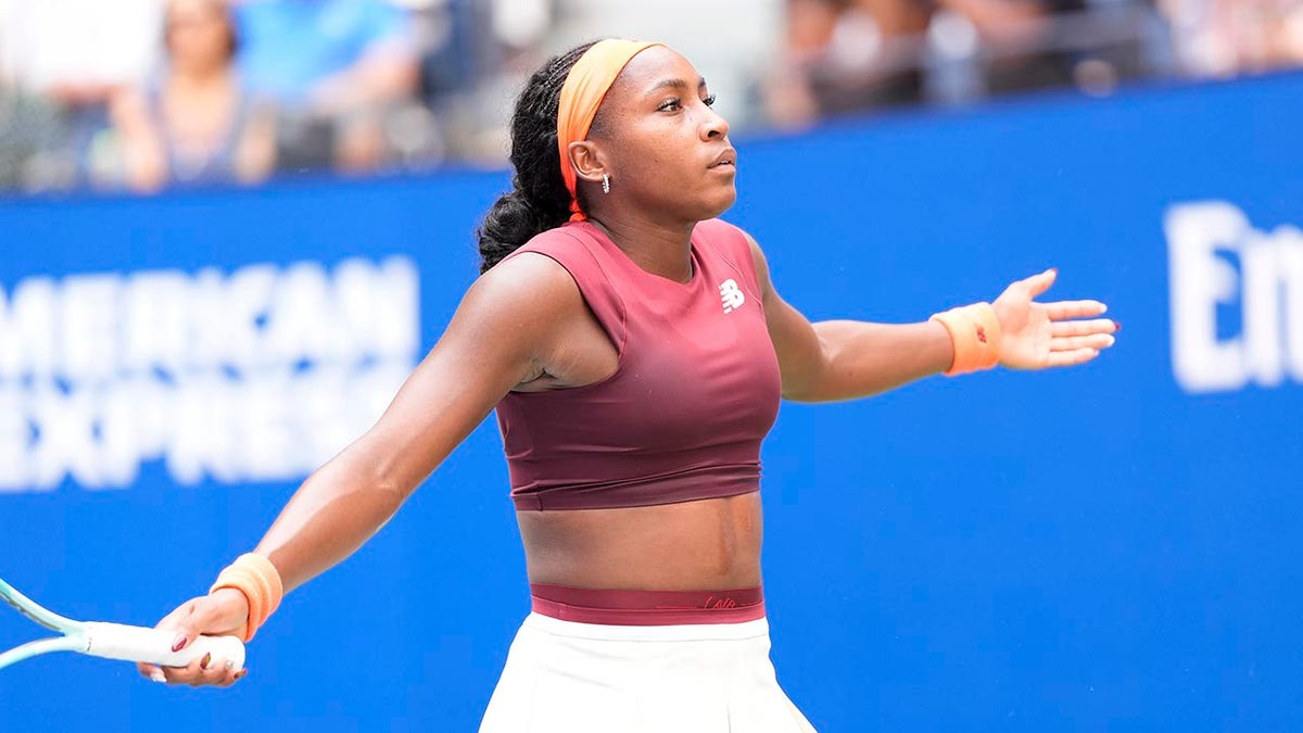 Coco Gauff reacting on court during a tennis match at the USTA Billie Jean King National Tennis Center
