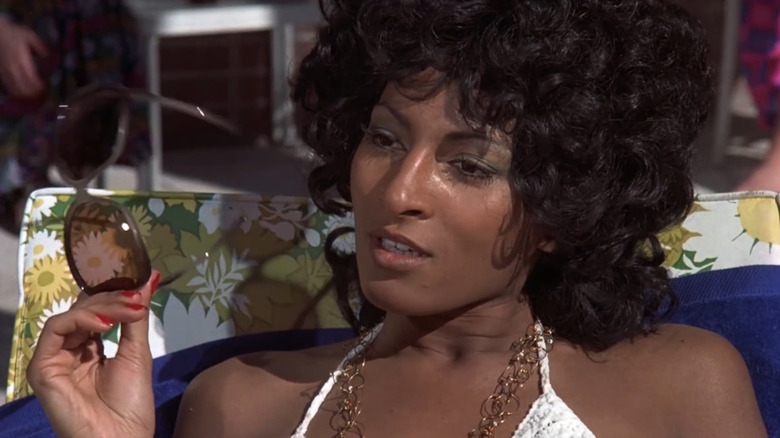 Pam Grier as Coffy, relaxing by the pool in Coffy