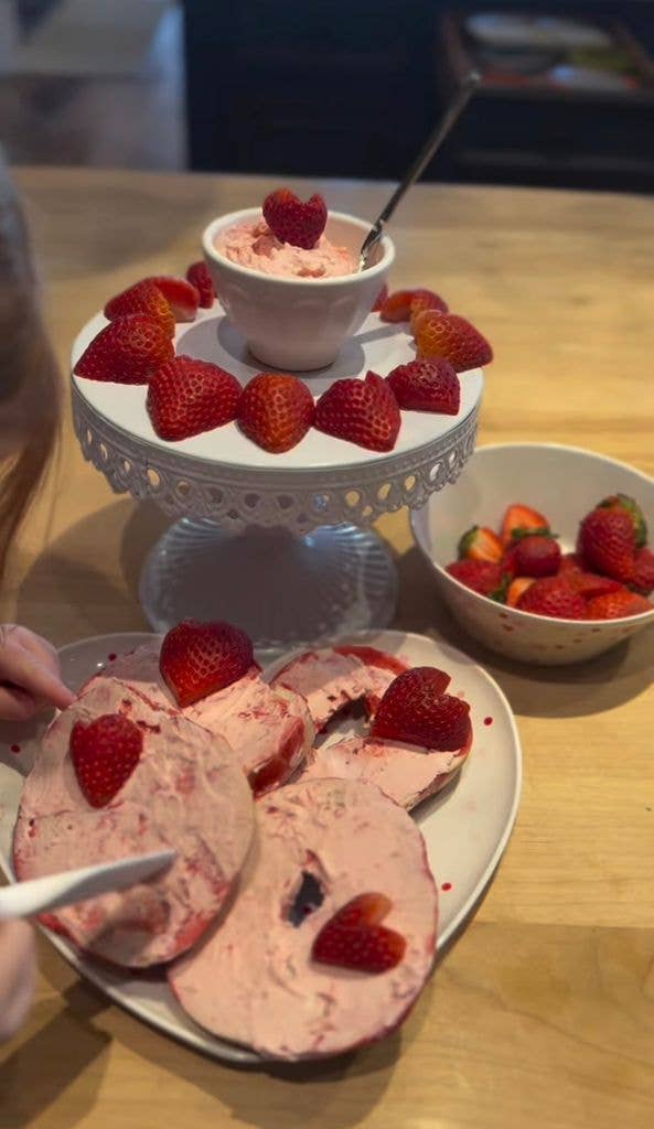 The side of a young girl's head by strawberries