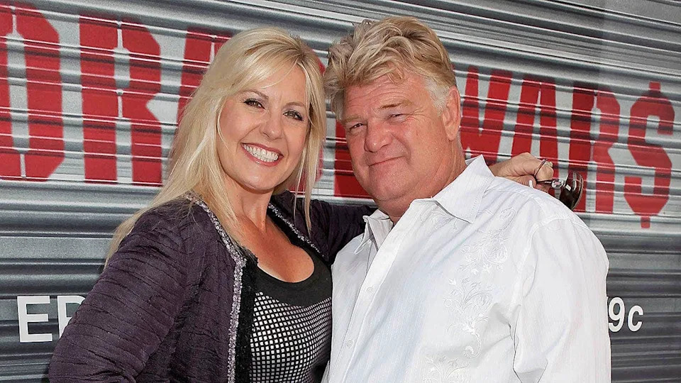 Laura Dotson and Dan Dotson standing together at Nokia Plaza L.A. LIVE in Los Angeles