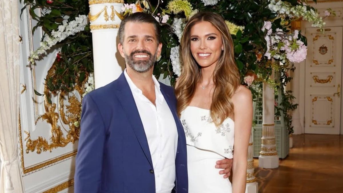 Donald Trump Jr. and Bettina Anderson seated together