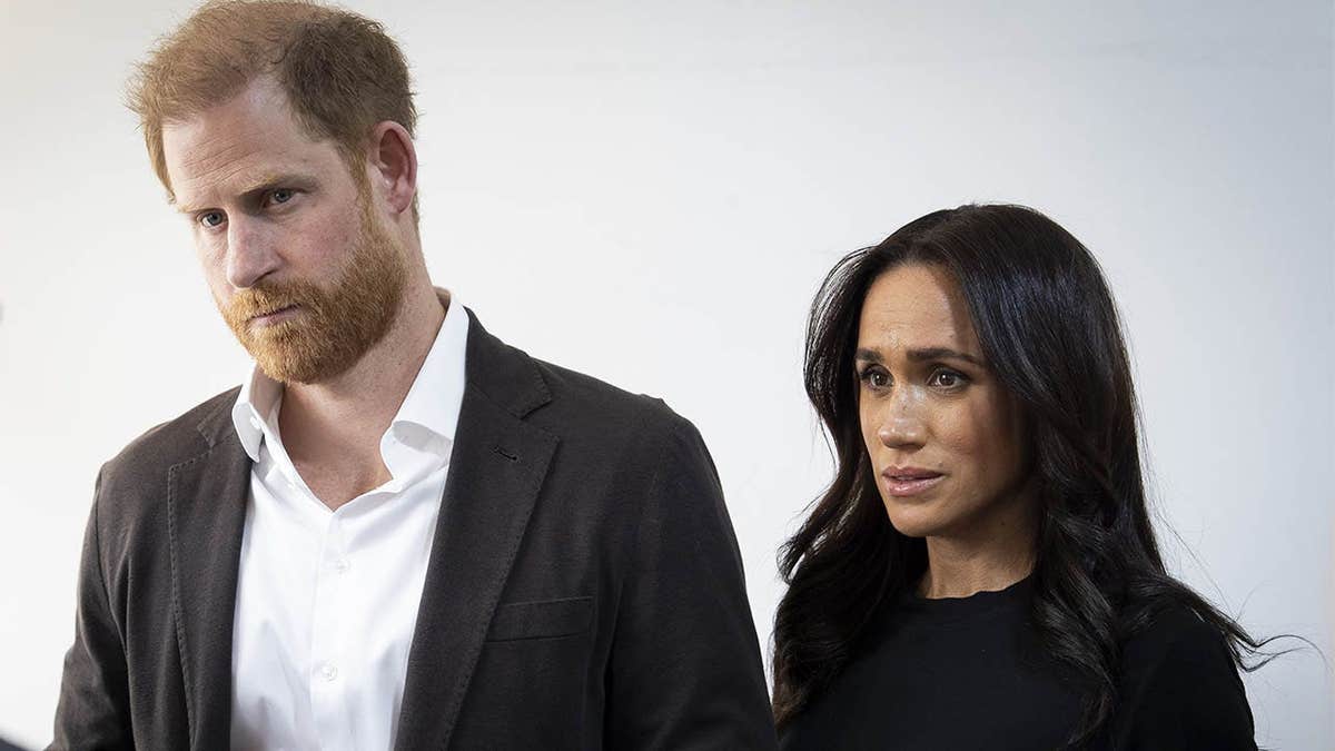 The Duke and Duchess of Sussex standing inside the World Central Kitchen office in Amman, Jordan