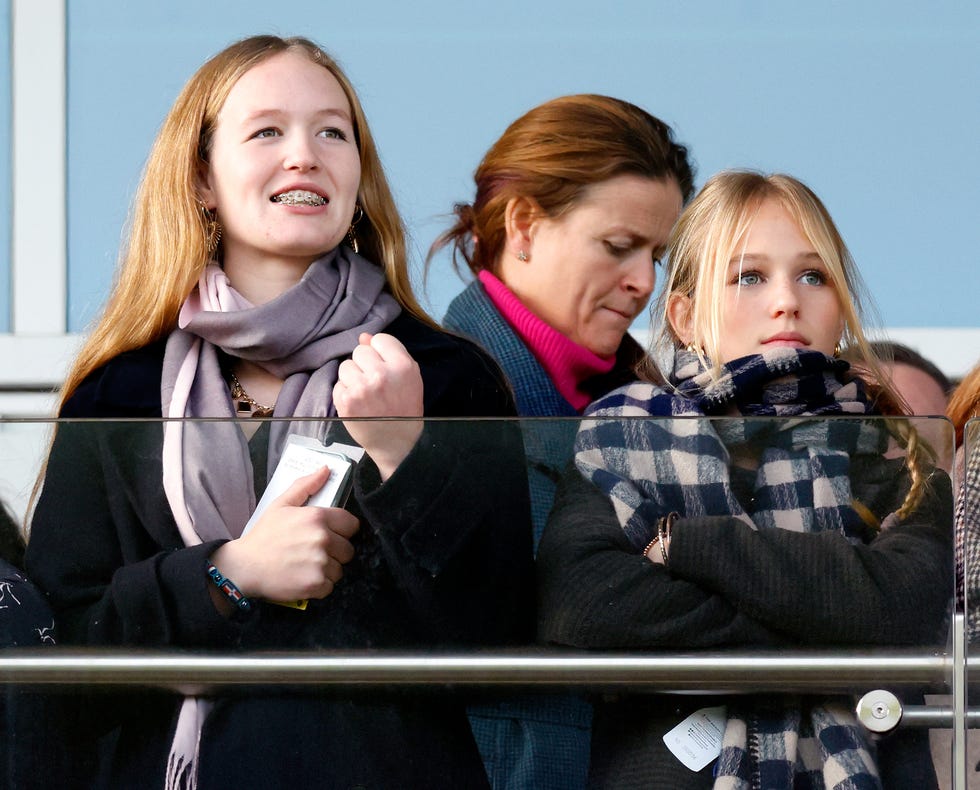 cheltenham, england january 01: (embargoed for publication in uk newspapers until 24 hours after create date and time) savannah phillips and isla phillips watch the racing as they attend the new years day racing meet at cheltenham racecourse on january 1, 2026 in cheltenham, england. (photo by max mumby/indigo/getty images)
