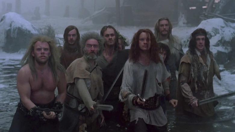 Tim Robbins as Erik leads a group of sword-wielding warriors in Erik the Viking