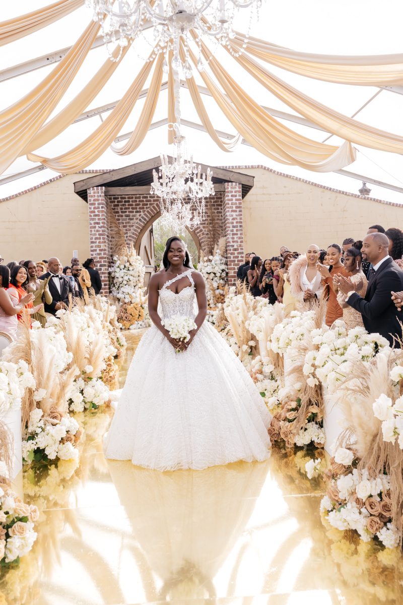 Exclusive: The Theme Was 'All Shades Of Melanin' For Noah Lyles And Junelle Bromfield's Georgia Wedding
