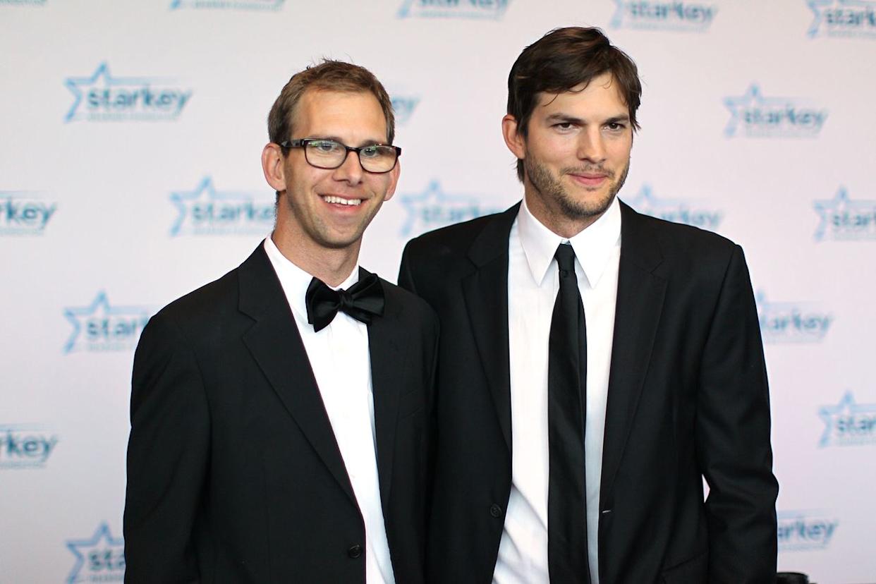 Michael Kutcher (left) and Ashton Kutcher attend the Starkey Hearing Foundation's 'So the World May Hear' awards gala in St. Paul, Minn., on July 28, 2013Credit: Adam Bettcher/Getty