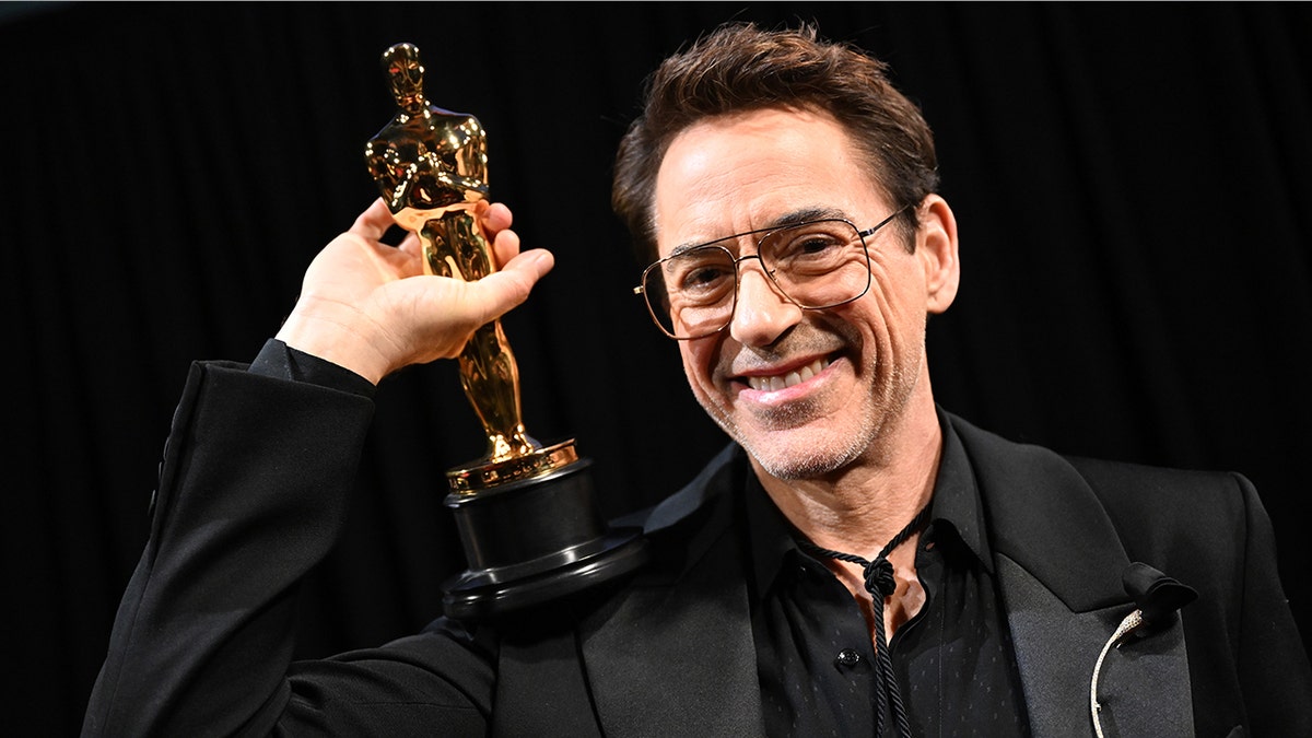 Robert Downey Jr. standing backstage at the 96th Annual Academy Awards in Hollywood