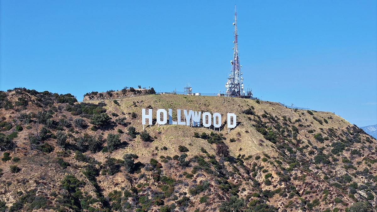 SAG-AFTRA logo displayed with Hollywood sign in background