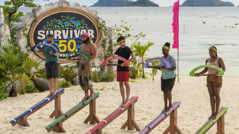The cast of Survivor 50 compete in an immunity challenge
