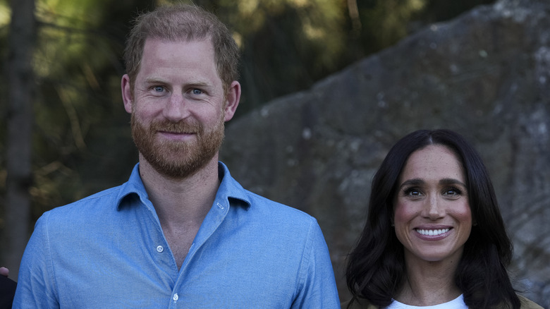 Prince Harry blue shirt with Meghan Markle