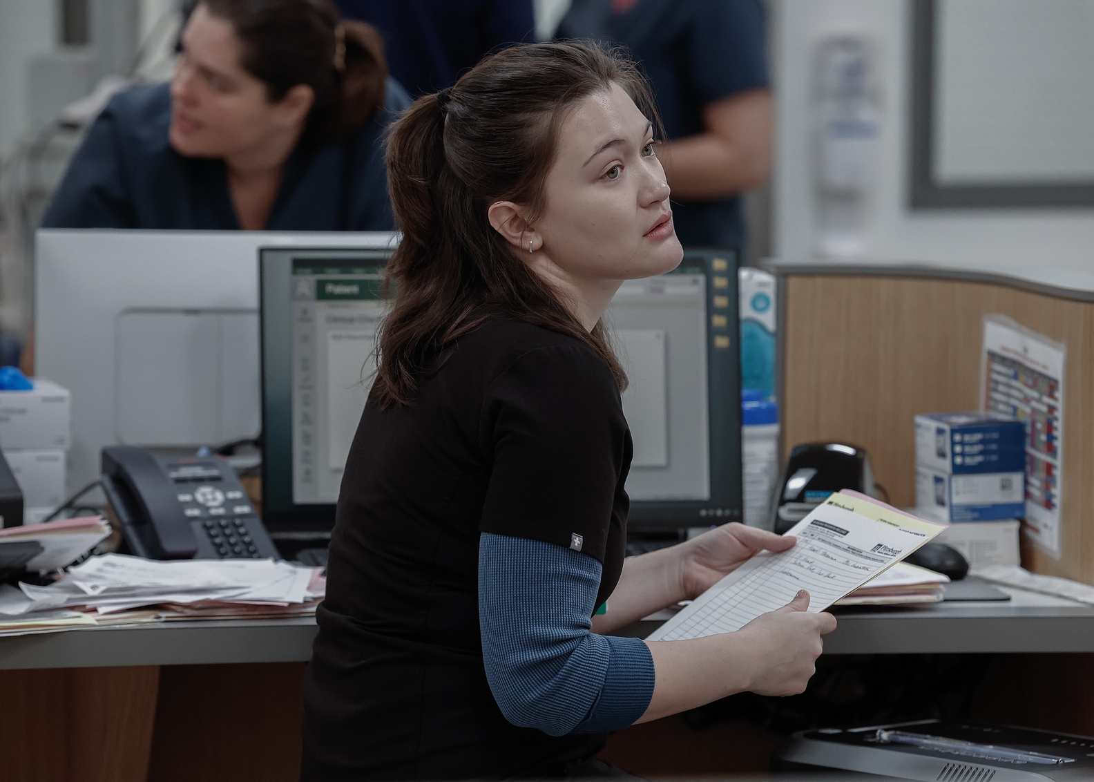 Robby tells the day shift to keep scanning until the work is done. Abbot gives zone instructions to Shen. Whitaker realizes he's lost his badge. (Warrick Page/HBOMAX)