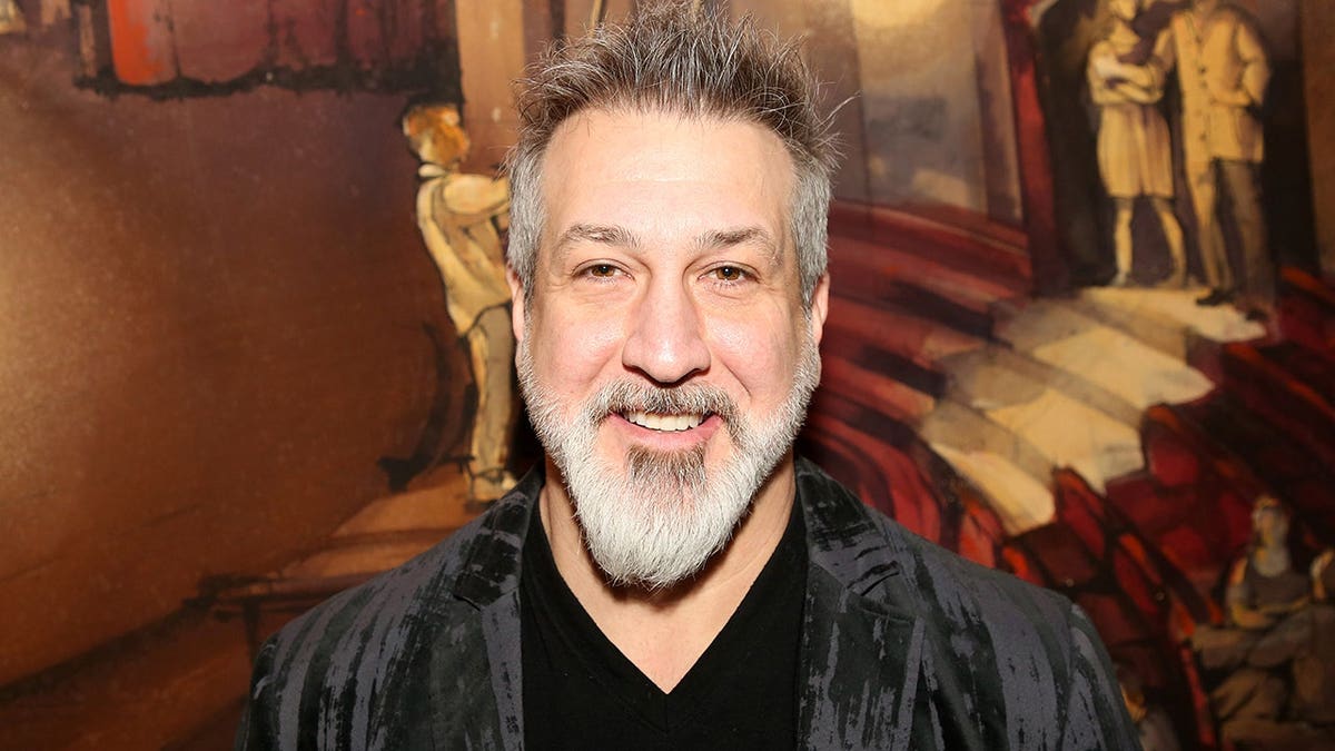 Joey Fatone posing at a press day for &Juliet musical in New York City