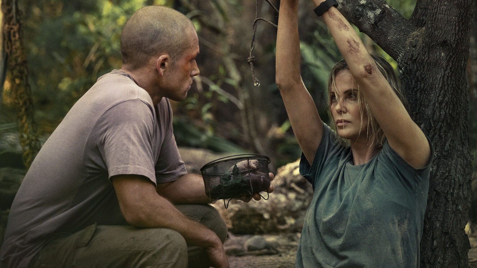 Apex Stars Charlize Theron And Taron Egerton Wanted To 'Kill Every Single Trope' In Their Survival Thriller [Exclusive Interview]