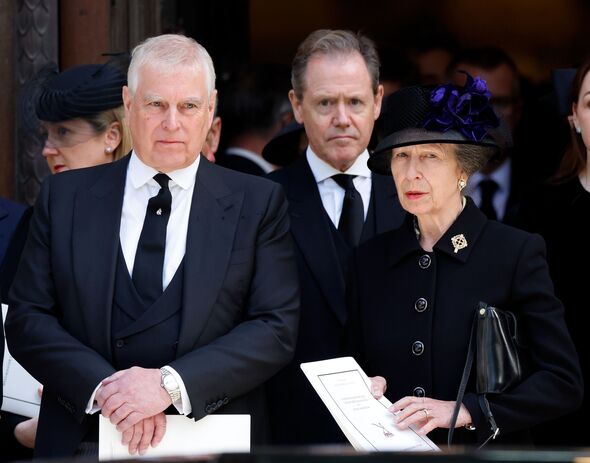 Andrew and Princess Anne stand next to each other at the funeral of the Duchess Of Kent