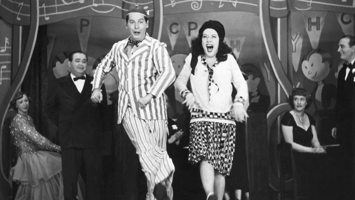 Milton Berle and Ethel Merman performing on the Texaco Star Theater stage
