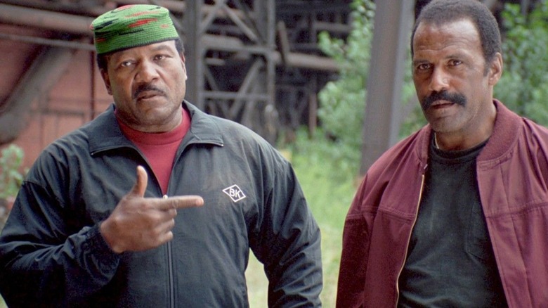 Jake pointing at John in 