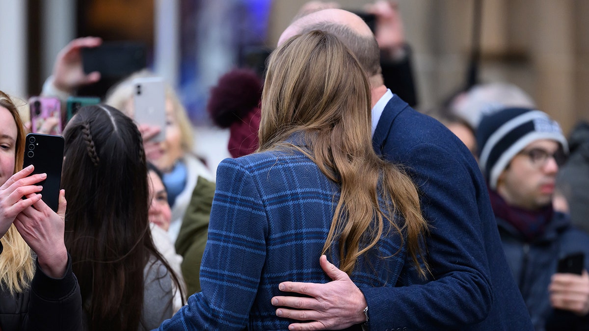 Prince William and Princess Catherine posing for a selfie at Radical Weavers studio in Stirling Scotland