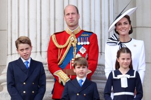 LONDON, ENGLAND - JUNE 15: Prince George of Wales, Prince William, Prince of Wales, Prince Louis of Wales, Princess Charlotte of Wales and Catherine, Princess of Wales during Trooping the Colour at Buckingham Palace on June 15, 2024 in London, England. Trooping the Colour is a ceremonial parade celebrating the official birthday of the British Monarch. The event features over 1,400 soldiers and officers, accompanied by 200 horses. More than 400 musicians from ten different bands and Corps of Drums march and perform in perfect harmony. (Photo by Chris Jackson/Getty Images)