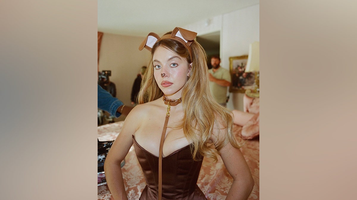 Sydney Sweeney dressed in a dog costume with ears and wings