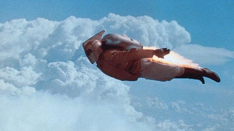 The Rocketeer flying through the clouds in The Rocketeer (1991)