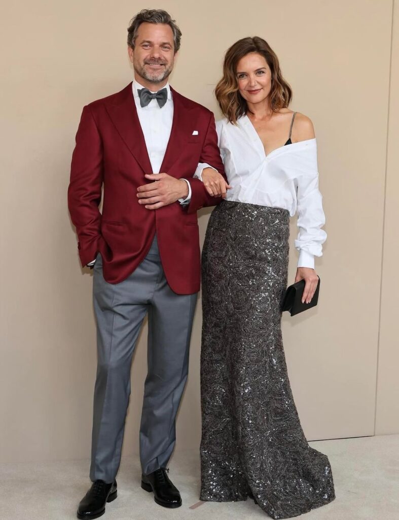 "Dawson's Creek" co-stars Katie Holmes and Joshua Jackson walk the red carpet together while attending the NYC premiere of the documentary "Brunello: The Gracious Visionary."