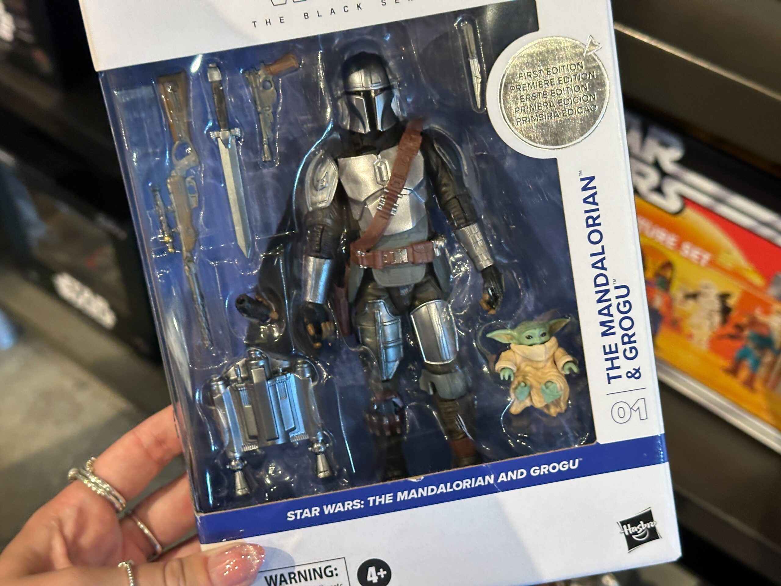 Close-up of front of Black Series First Edition Mandalorian and Grogu Figures.