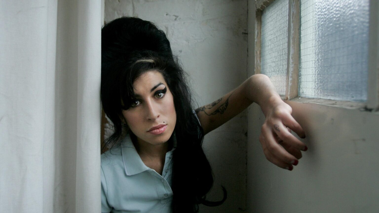 Amy Winehouse's father loses legal bid for funds friends made selling her memorabilia