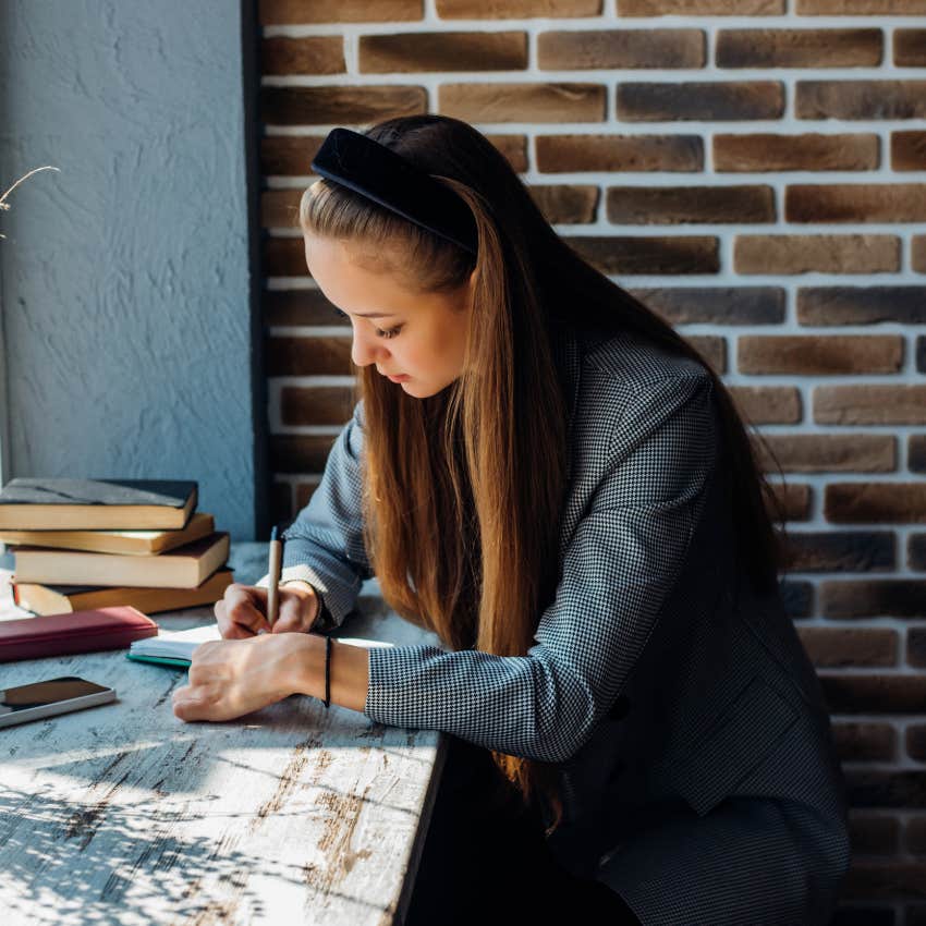 woman sending out invitations to celebrities for her college graduation