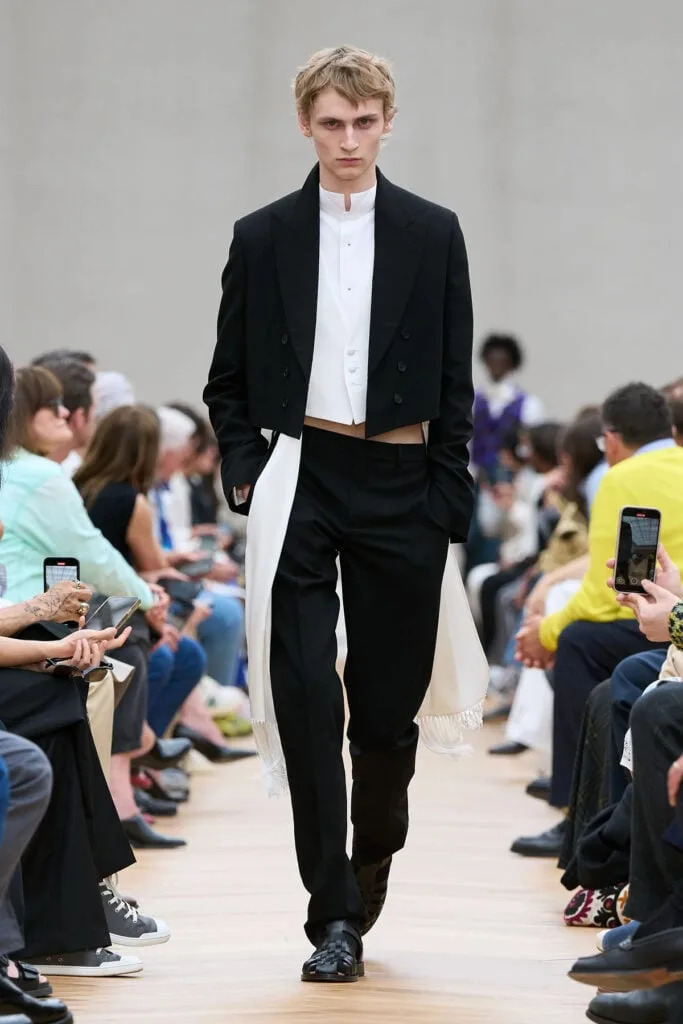 Dior Spring 2026 menswear tuxedo-inspired tailoring on the runway during Paris Fashion Week.
