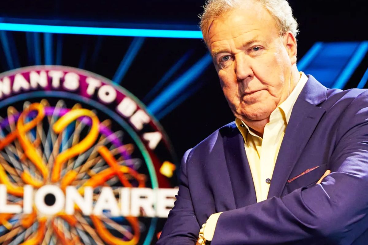 Jeremy Clarkson in blue suit on Who Wants To Be A Millionaire set