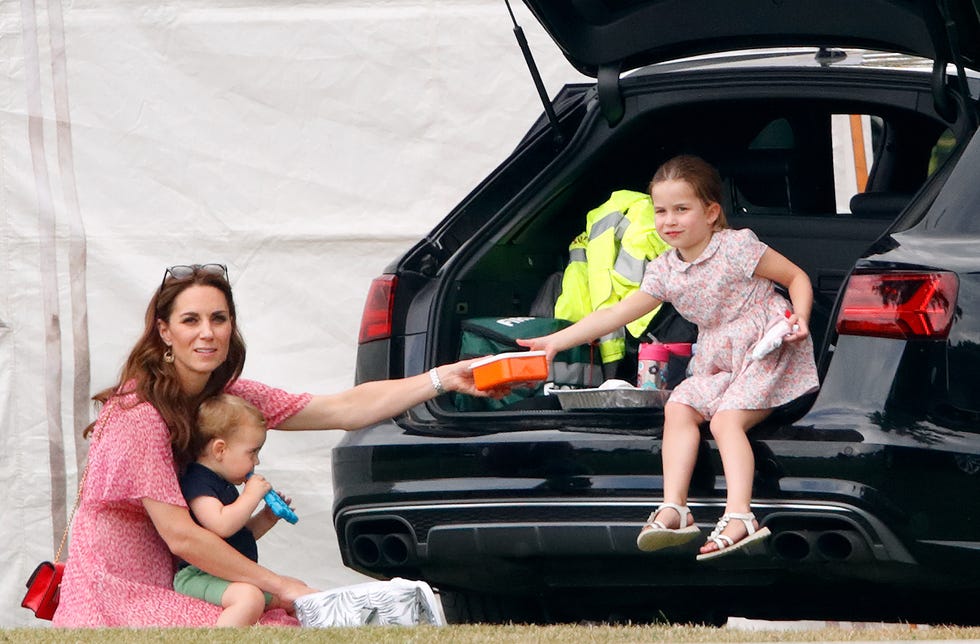 wokingham, united kingdom july 10: (embargoed for publication in uk newspapers until 24 hours after create date and time) catherine, duchess of cambridge, prince louis of cambridge and princess charlotte of cambridge attend the king power royal charity polo match, in which prince william, duke of cambridge and prince harry, duke of sussex were competing for the khun vichai srivaddhanaprabha memorial polo trophy at billingbear polo club on july 10, 2019 in wokingham, england. (photo by max mumby/indigo/getty images)