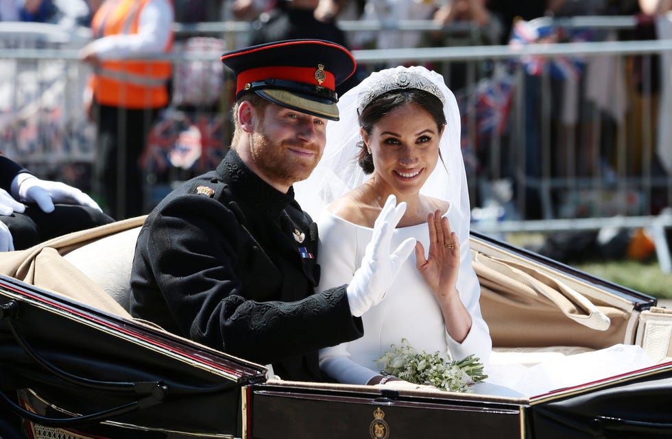 windsor, england may 19 editors note retransmission of 960087582 with alternate crop prince harry, duke of sussex and meghan, duchess of sussex wave from the ascot landau carriage during their carriage procession on castle hill outside windsor castle in windsor, on may 19, 2018 after their wedding ceremony photo by aaron chown  wpa poolgetty images