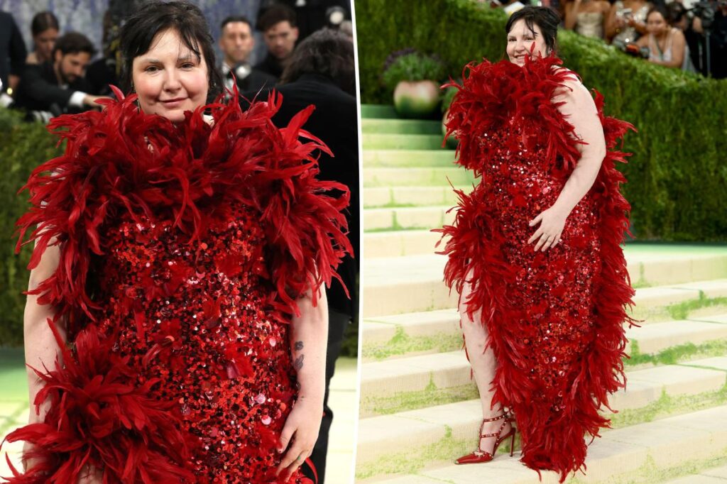 Lena Dunham wears red feathers and sequins at Met Gala 2026
