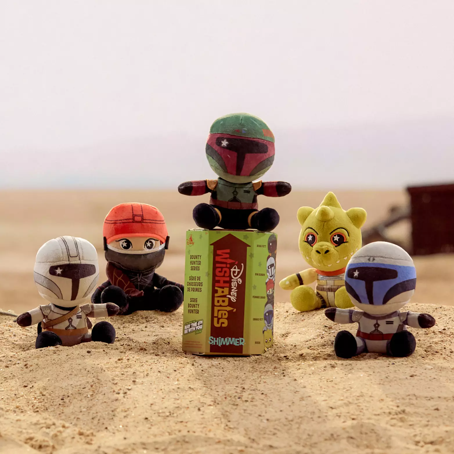 Each box contains one of five plush bounty hunters, each standing about 5 1/2″ tall.